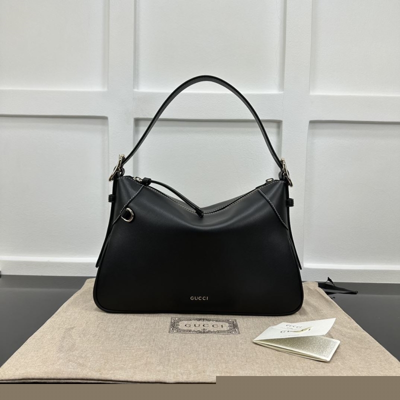 G*u*i top handle bags